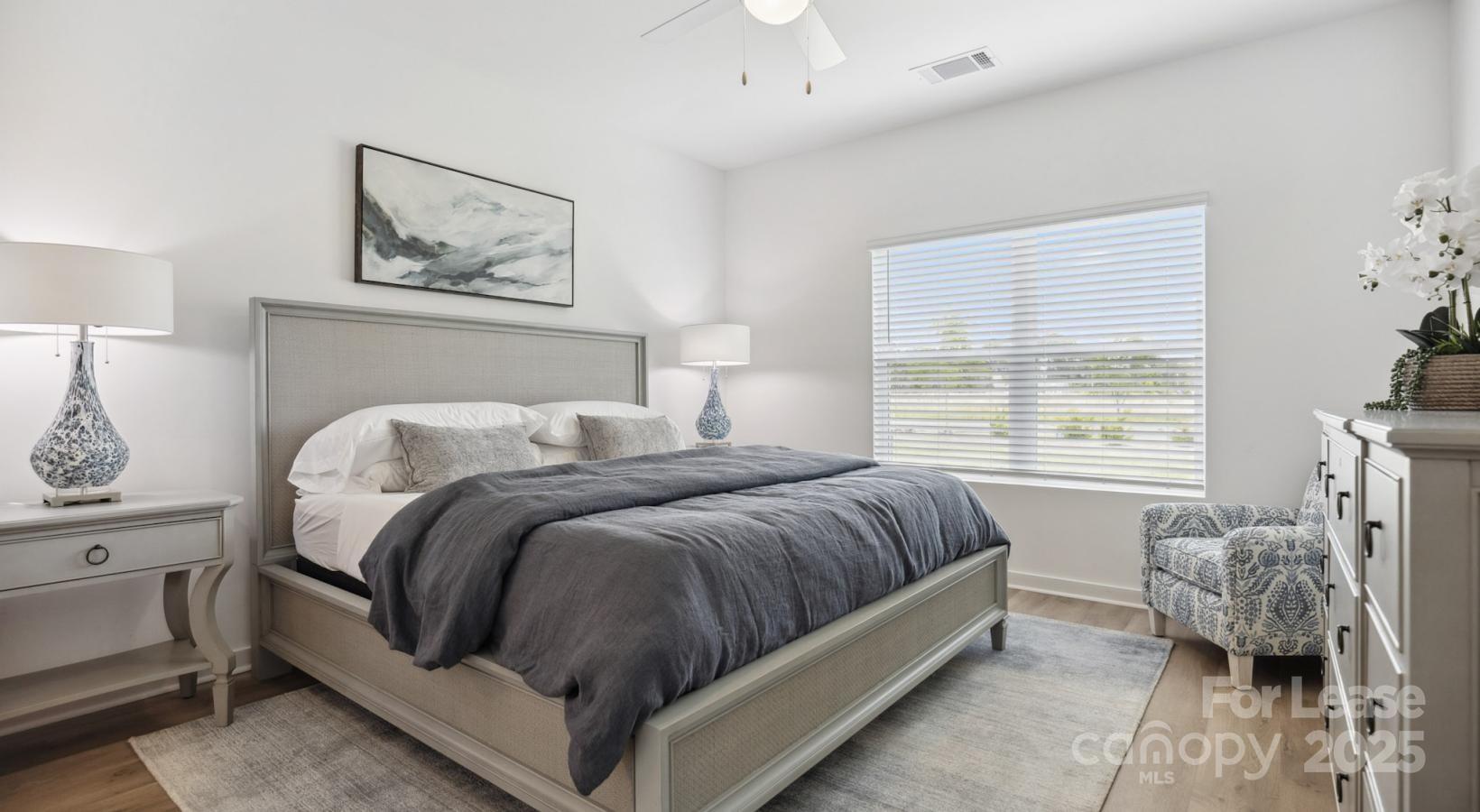 129 Blume Road, Unit MEANDER Mooresville, NC 28117 - Photo 19 of 32 a bedroom with a bed and window
