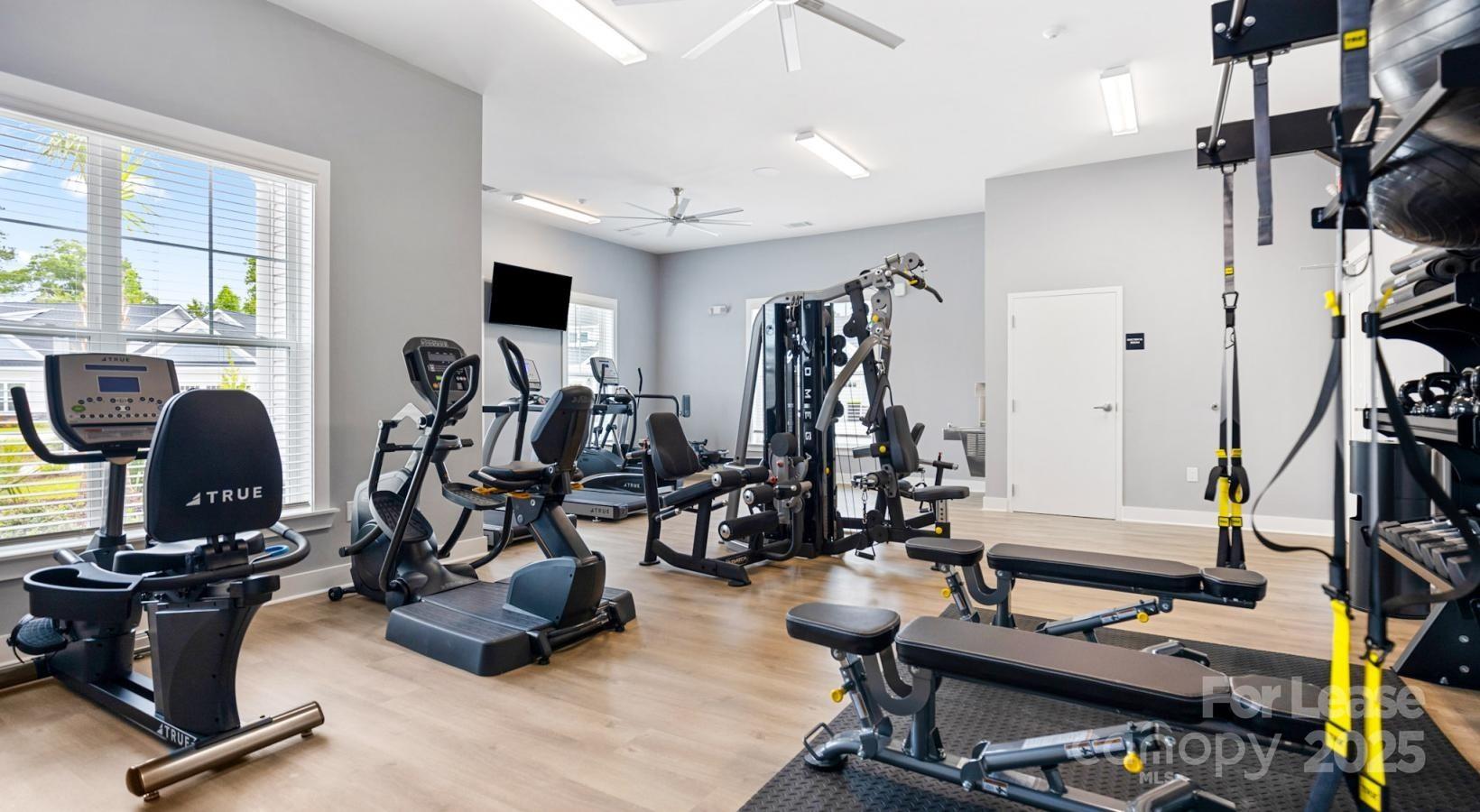 129 Blume Road, Unit MEANDER Mooresville, NC 28117 - Photo 28 of 32 a view of a room with gym equipment