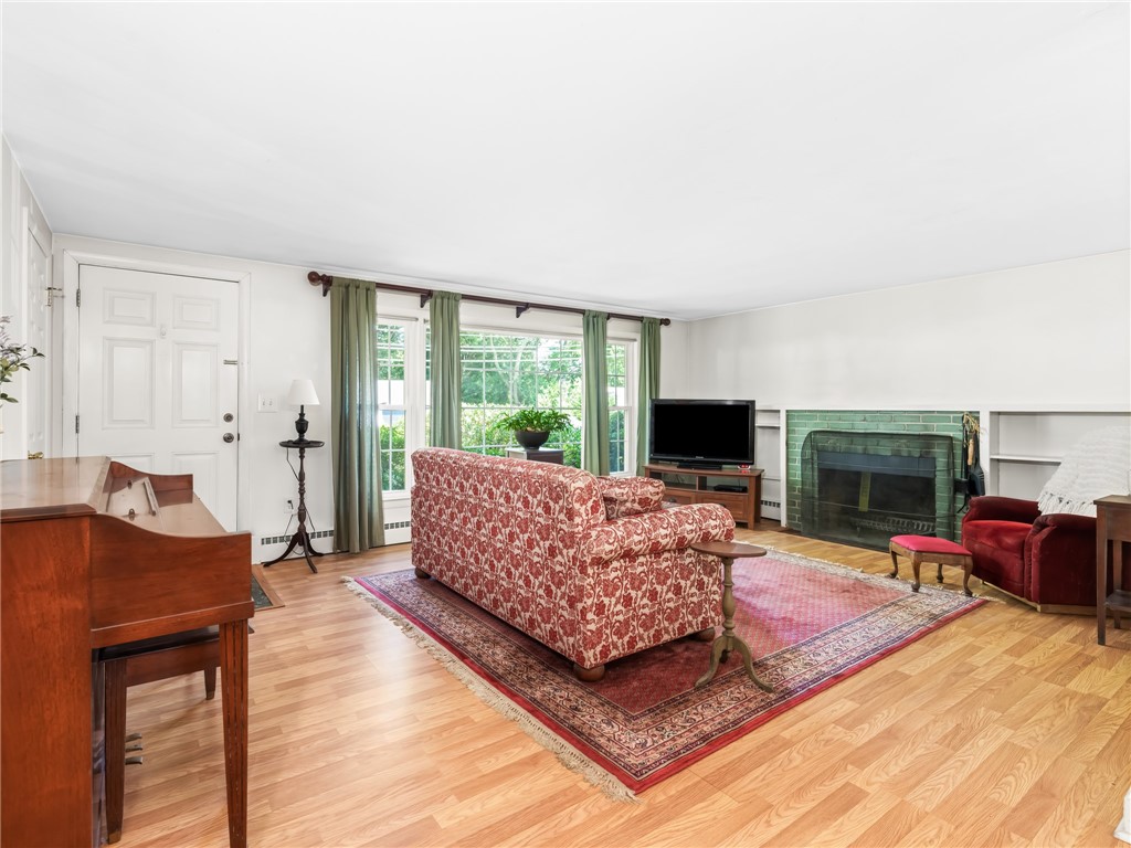 100 Diamond Hill Road Warwick, RI 02886 - Photo 4 of 23 Living room with brick fireplace