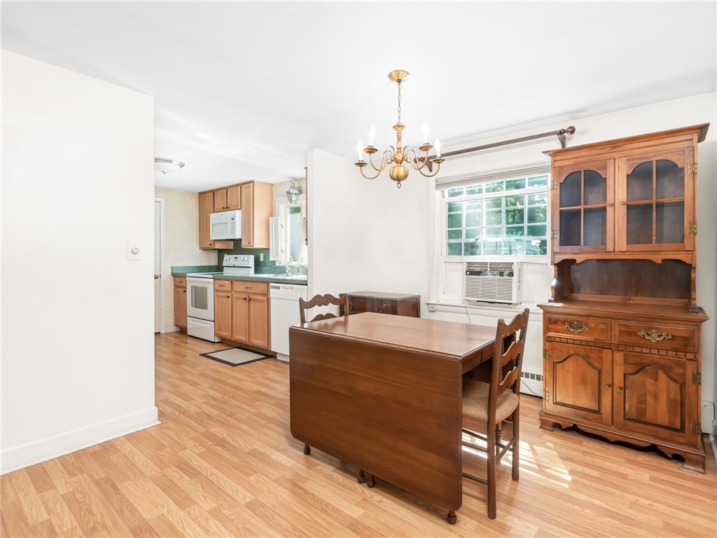 100 Diamond Hill Road Warwick, RI 02886 - Photo 8 of 23 Dining area and kitchen