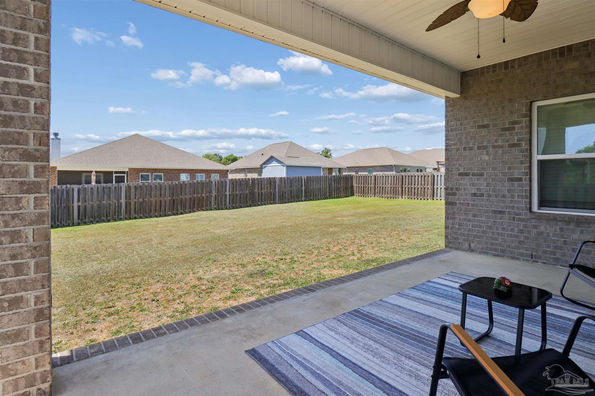 335 Cayden Way Cantonment, FL 32533 - Photo 25 of 30 a view of a outdoor space with seating area