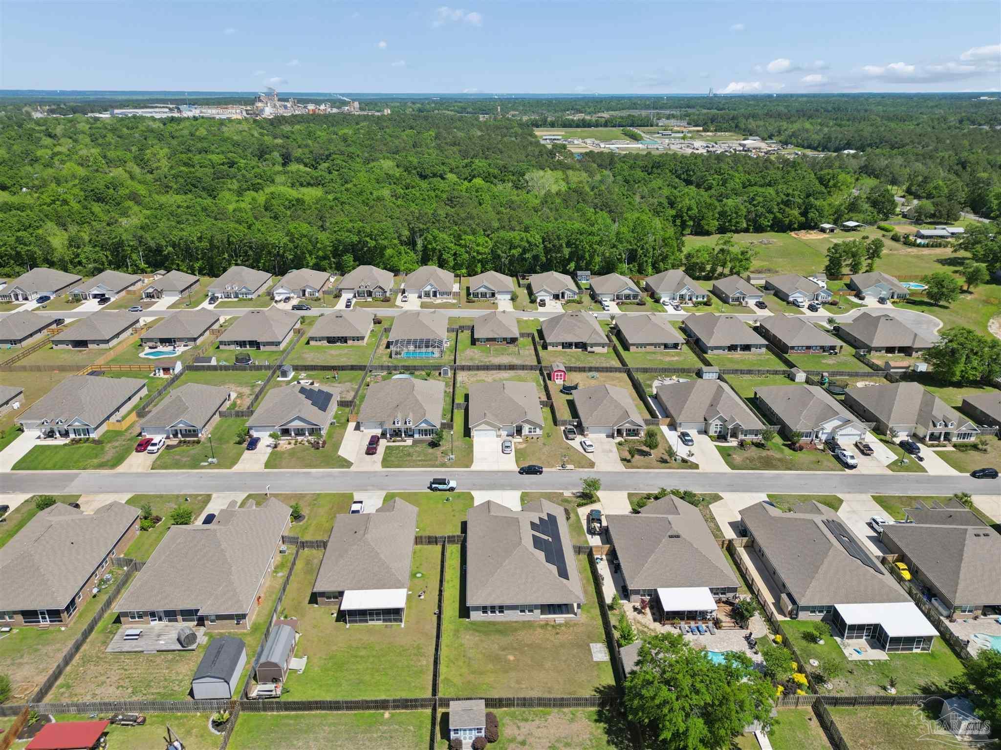 335 Cayden Way Cantonment, FL 32533 - Photo 29 of 30 an aerial view of residential houses with outdoor space and trees