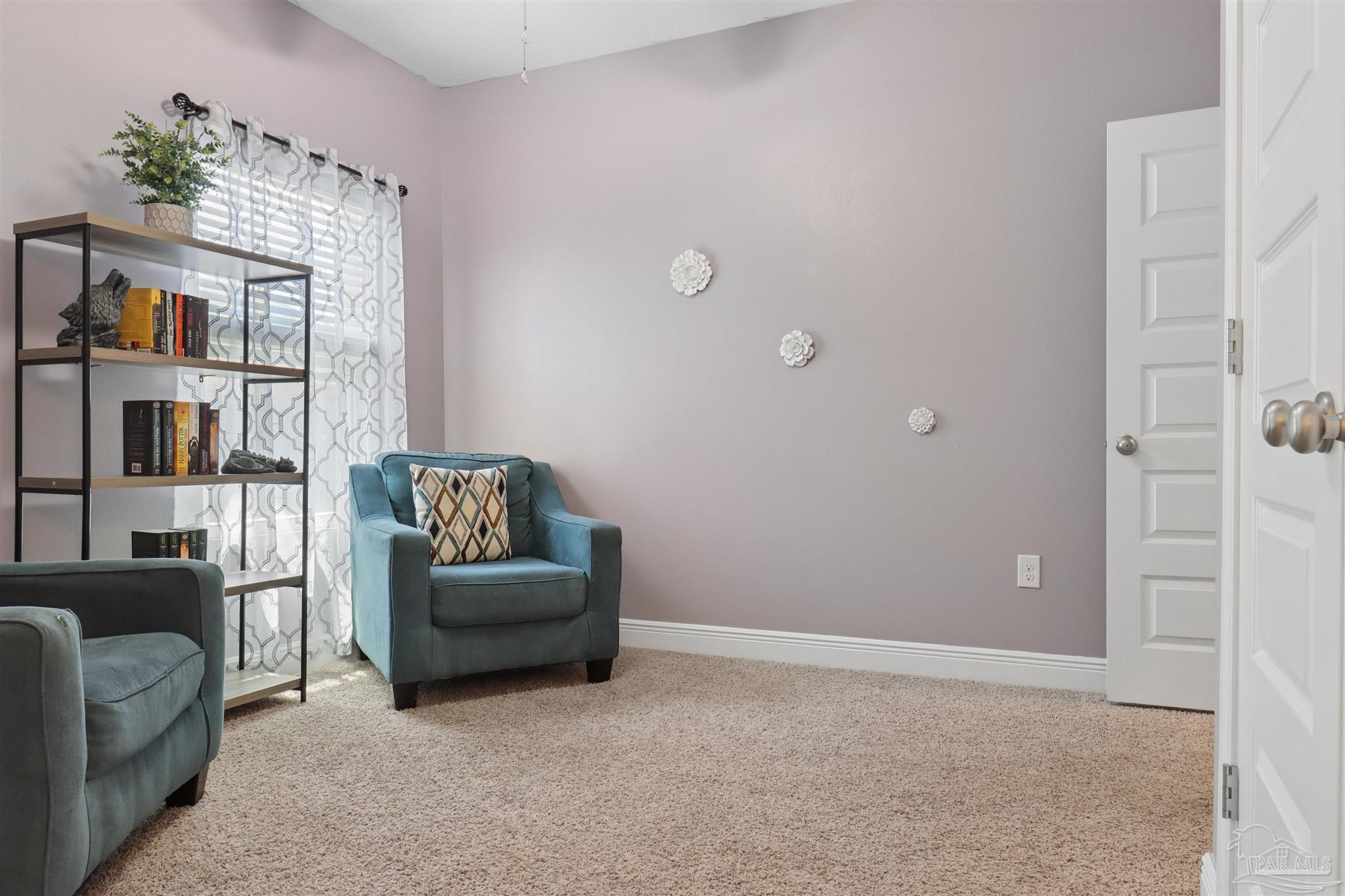 335 Cayden Way Cantonment, FL 32533 - Photo 5 of 30 a living room with furniture and a window
