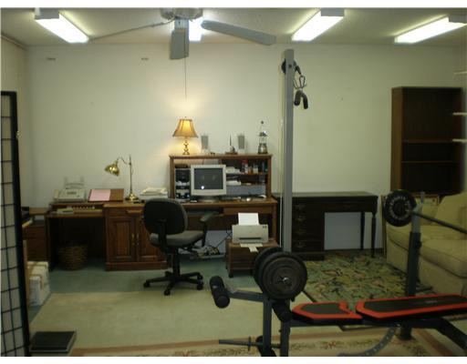 9727 Tavernier Drive Boca Raton, FL 33496 - Photo 5 of 16 a room with musical instruments