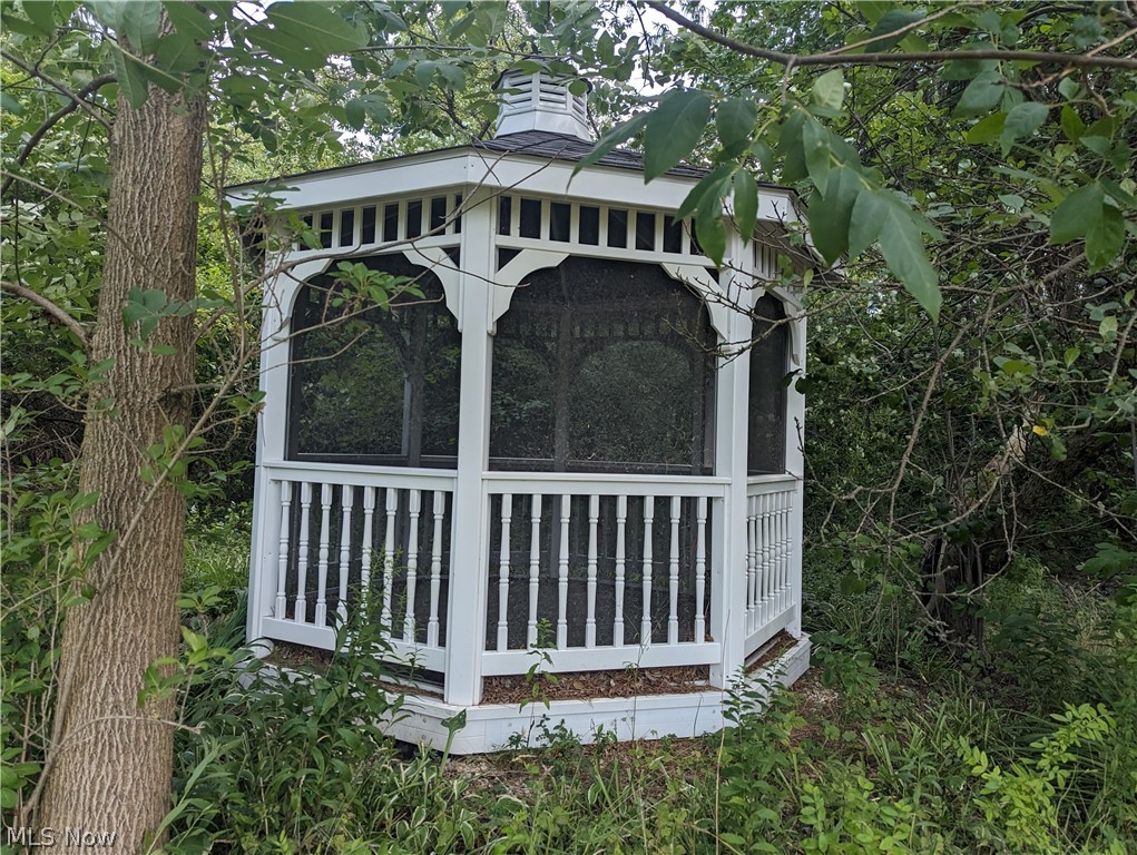 12781 Caves Road Chesterland, OH 44026 - Photo 17 of 28 Gazebo in woods edge in back of property