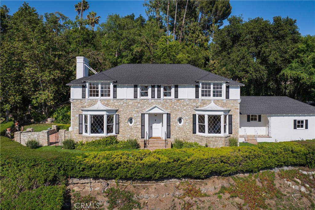 1625 Campbell Street Glendale, CA 91207 - Photo 1 of 19 a front view of a house with a garden