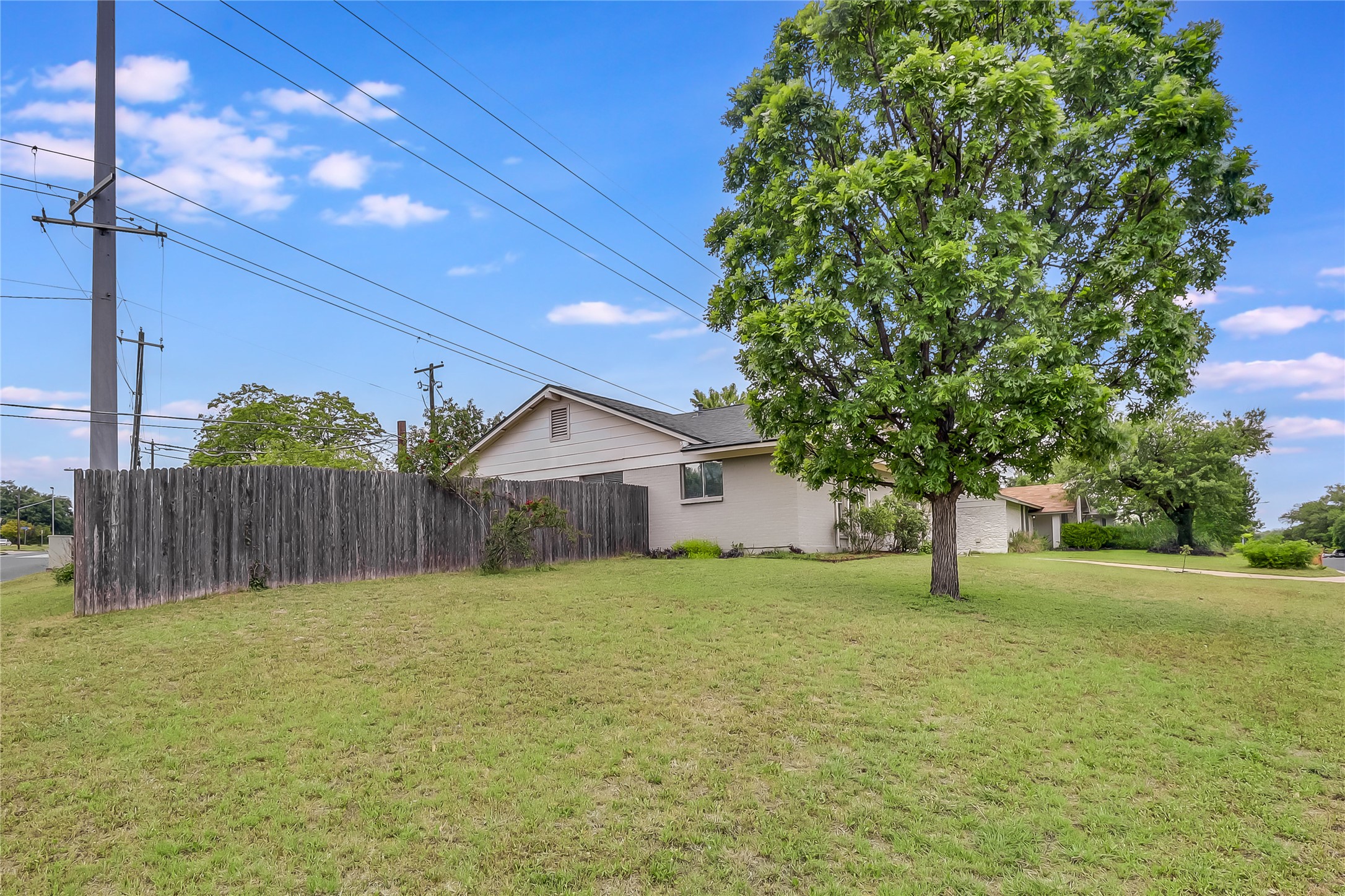 7300 Glenhill Road Austin, TX 78752 - Photo 35 of 37 a house with garden in front of it