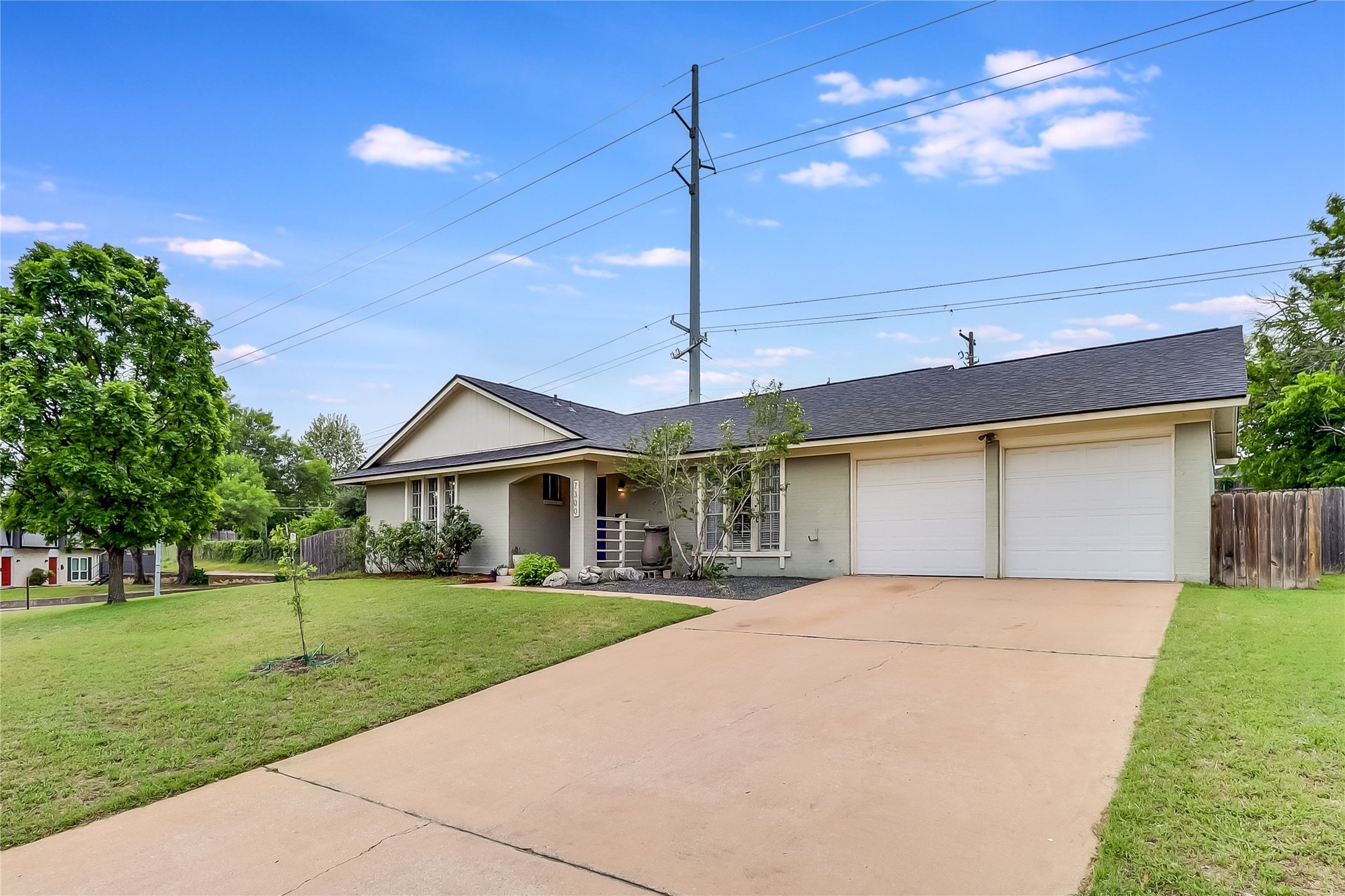 7300 Glenhill Road Austin, TX 78752 - Photo 36 of 37 a front view of house with yard and green space