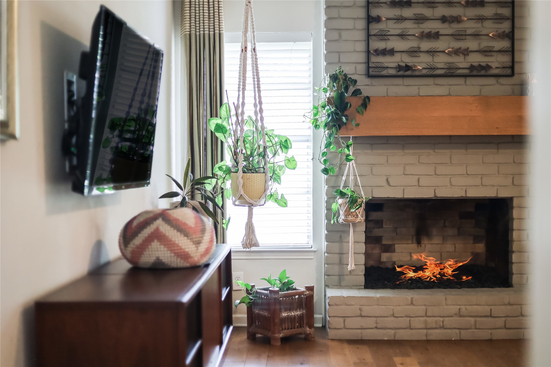 7300 Glenhill Road Austin, TX 78752 - Photo 7 of 37 a living room with furniture and a fireplace