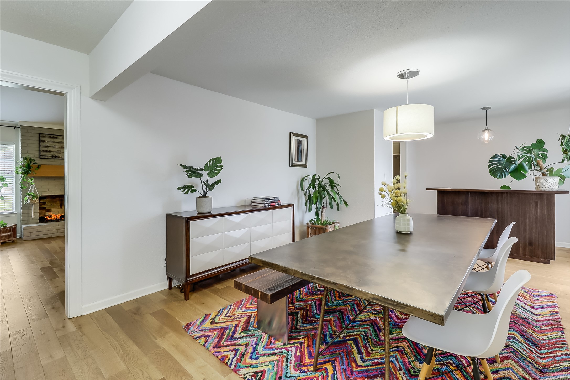 7300 Glenhill Road Austin, TX 78752 - Photo 9 of 37 a view of a dining room with furniture and wooden floor