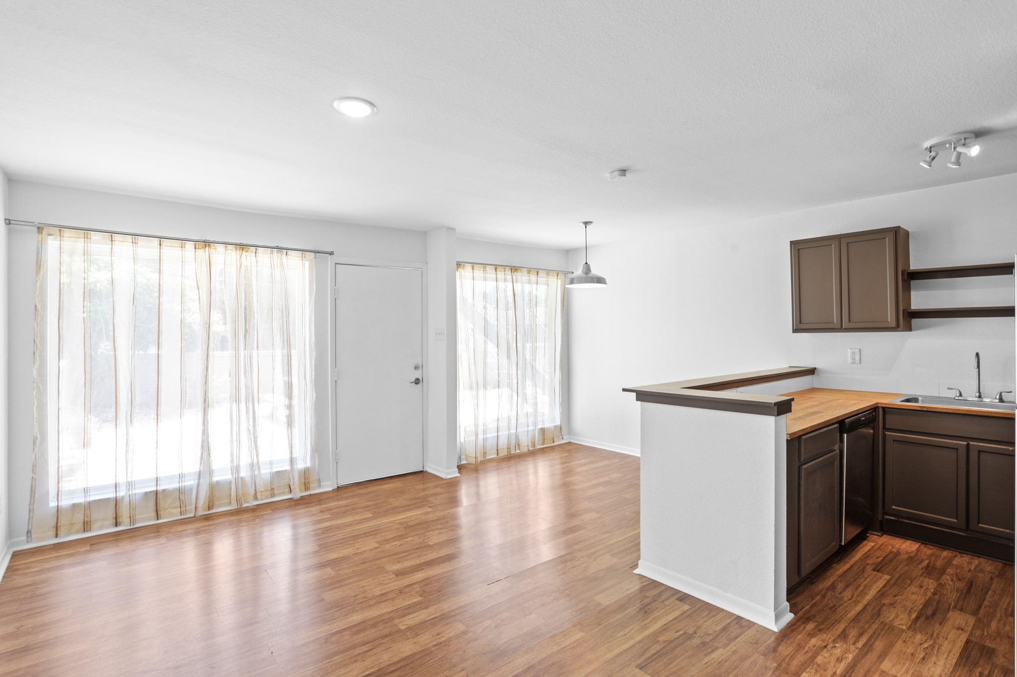 1408 Hughes Street, Unit 4 Houston, TX 77023 - Photo 11 of 27 View from the living area to the kitchen and dining space. All open concept for the best flow.