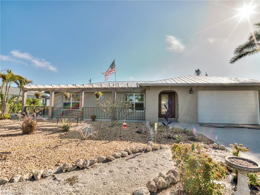 20621 Coconut Drive Estero, FL 33928 - Photo 1 of 37 a front view of a house
