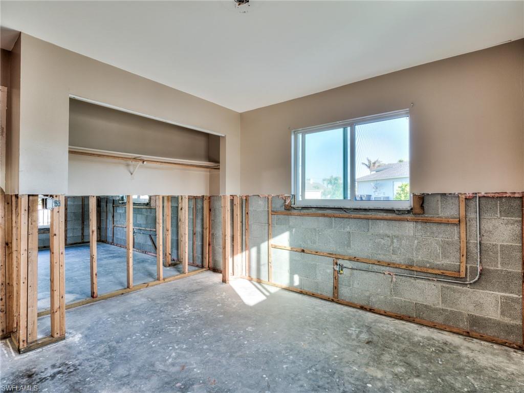 20621 Coconut Drive Estero, FL 33928 - Photo 12 of 37 a view of a kitchen with a sink and cabinets