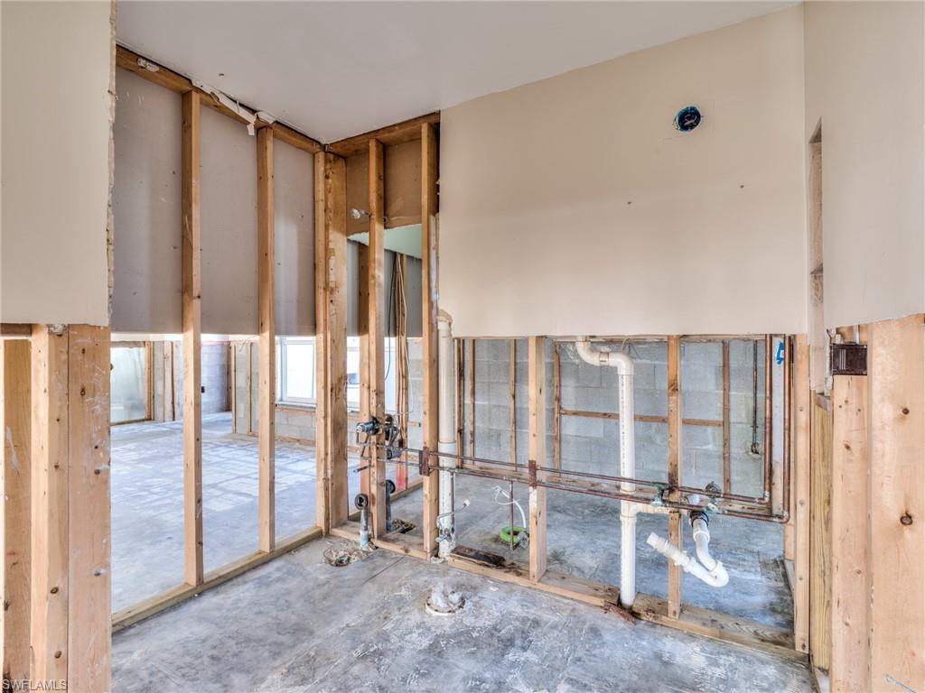 20621 Coconut Drive Estero, FL 33928 - Photo 14 of 37 a view of a room with large windows