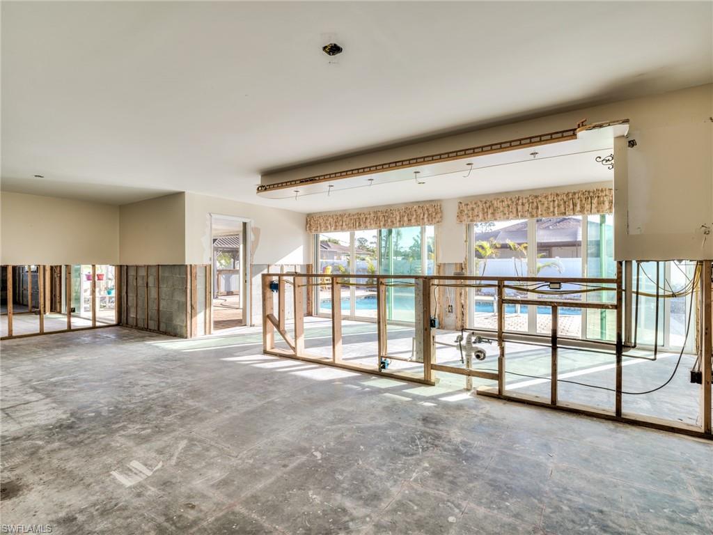20621 Coconut Drive Estero, FL 33928 - Photo 19 of 37 a view of an empty room with windows