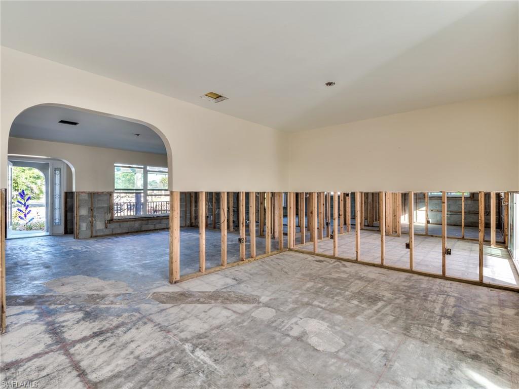 20621 Coconut Drive Estero, FL 33928 - Photo 20 of 37 a view of a livingroom with wooden floor and window