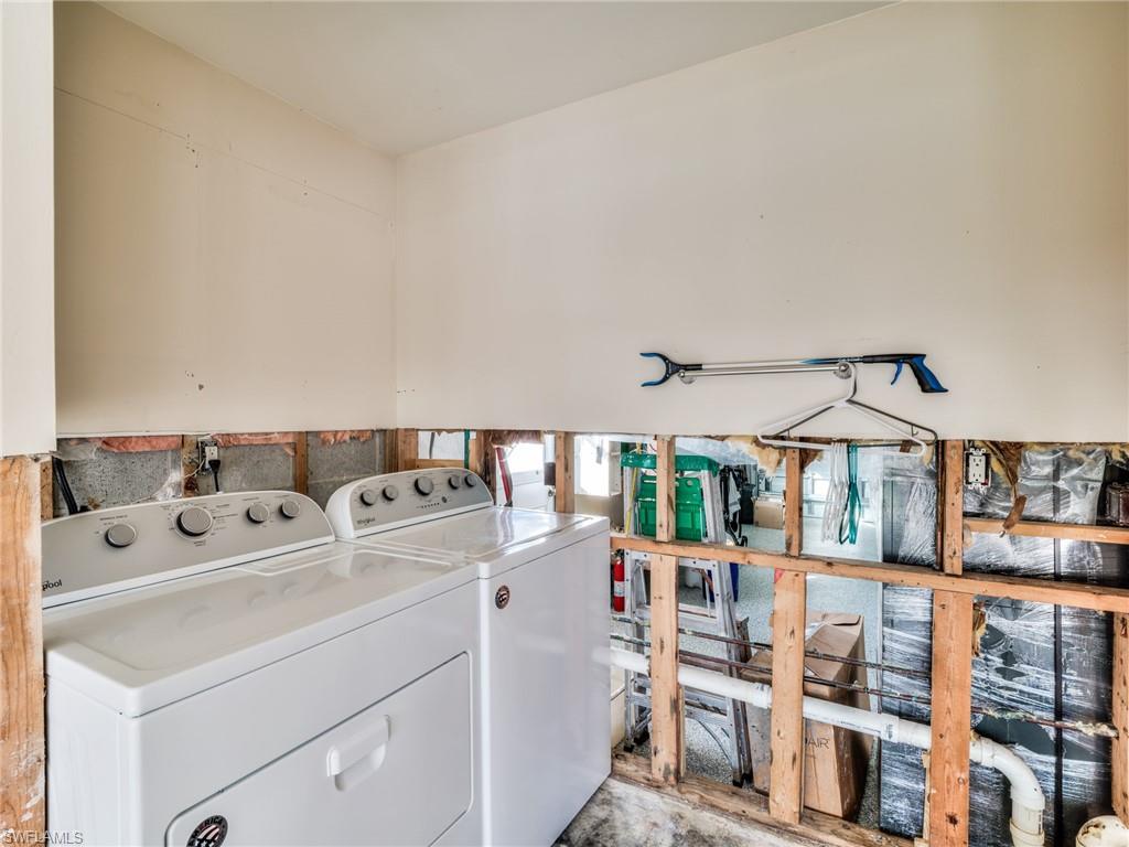 20621 Coconut Drive Estero, FL 33928 - Photo 26 of 37 a utility room with dryer and washer