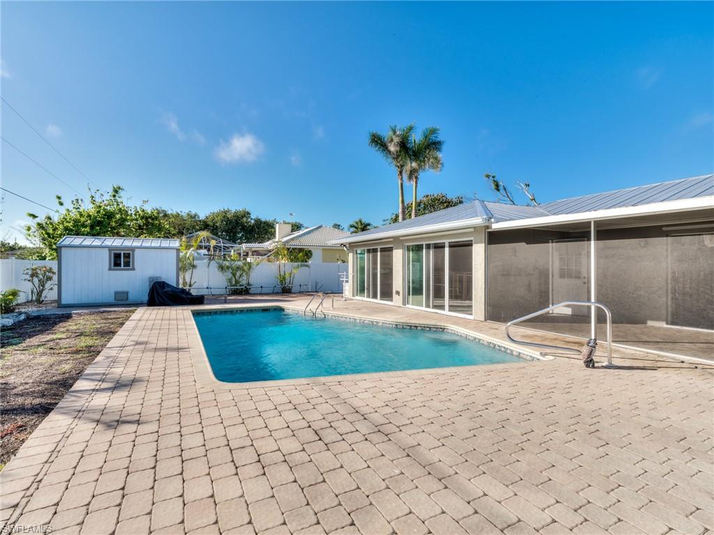 20621 Coconut Drive Estero, FL 33928 - Photo 31 of 37 a front view of a house with a yard