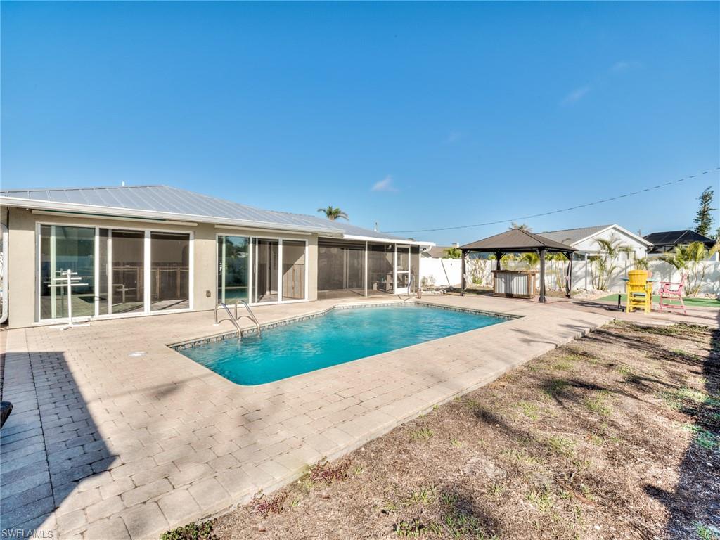 20621 Coconut Drive Estero, FL 33928 - Photo 35 of 37 a view of a house with a garden