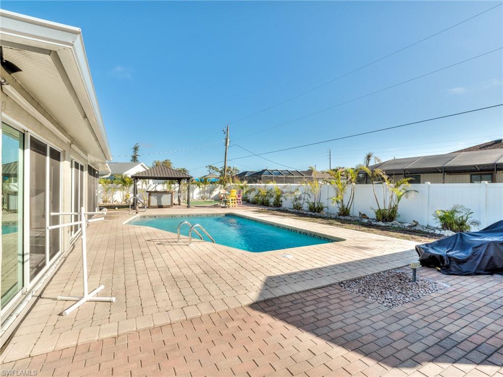 20621 Coconut Drive Estero, FL 33928 - Photo 36 of 37 a view of swimming pool with outdoor seating