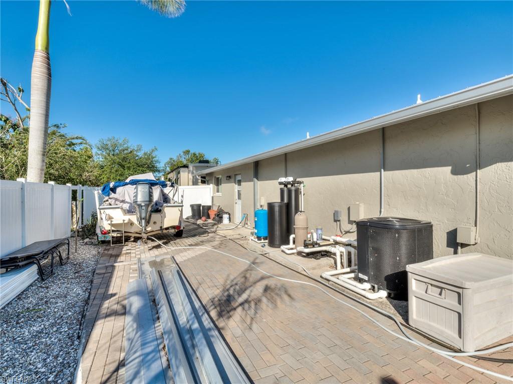 20621 Coconut Drive Estero, FL 33928 - Photo 37 of 37 a view of a kitchen with a sink and furniture