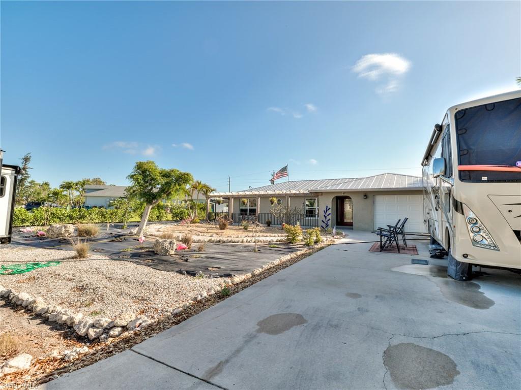 20621 Coconut Drive Estero, FL 33928 - Photo 6 of 37 a view of a living room and kitchen