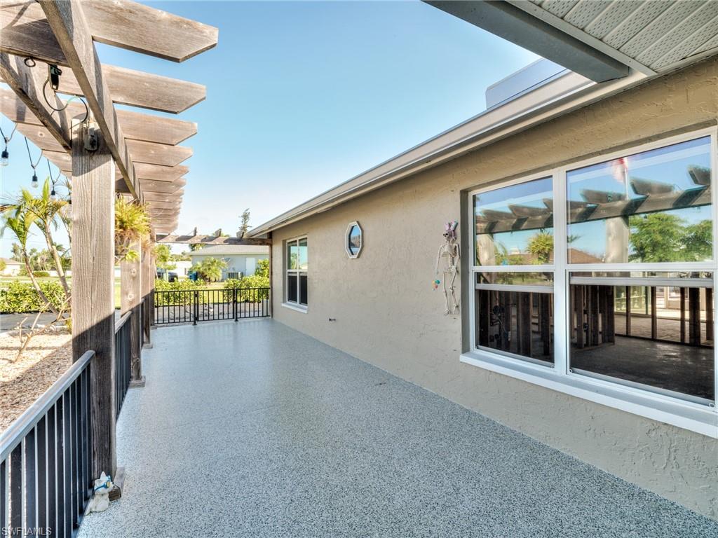 20621 Coconut Drive Estero, FL 33928 - Photo 7 of 37 a view of a porch with seating space