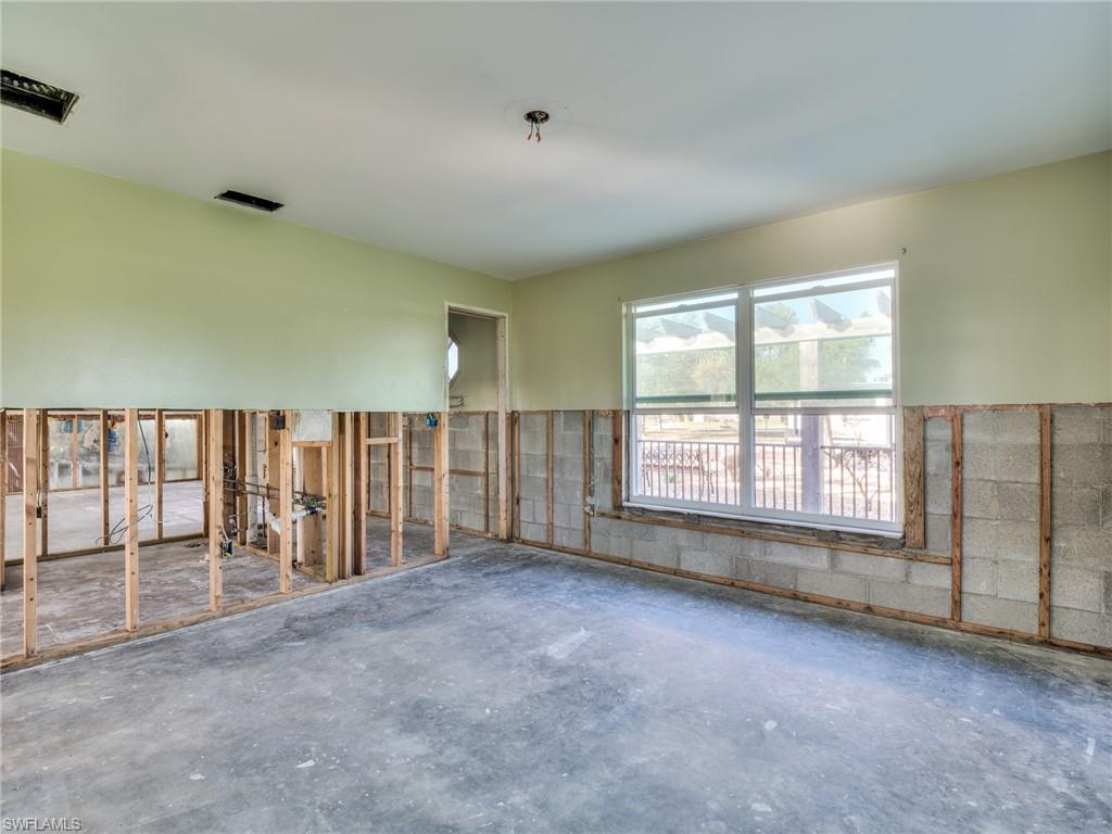 20621 Coconut Drive Estero, FL 33928 - Photo 9 of 37 a view of an empty room with a window