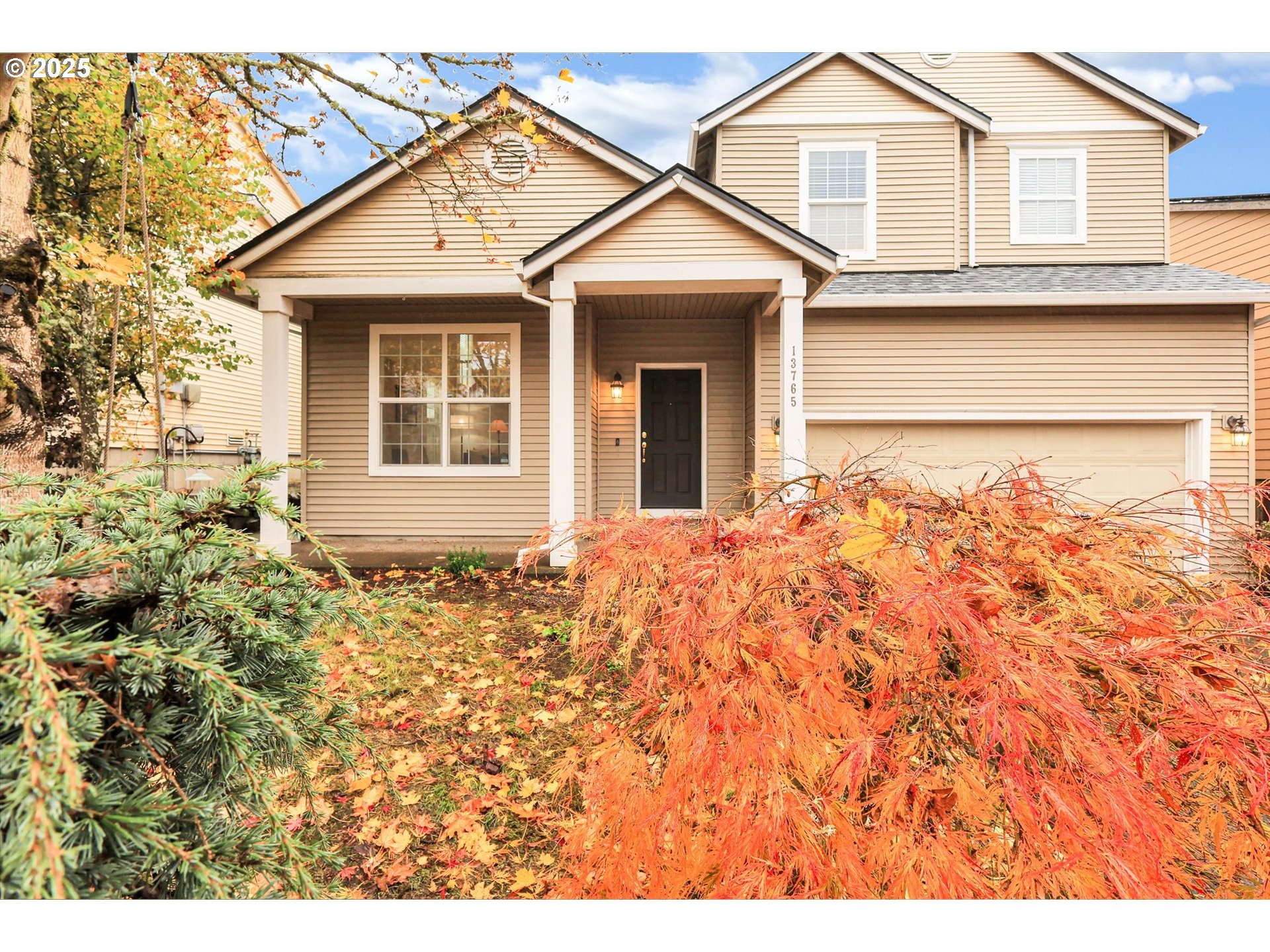 13765 Southwest Florentine Avenue Portland, OR 97223 - Photo 1 of 34 a front view of a house with a yard