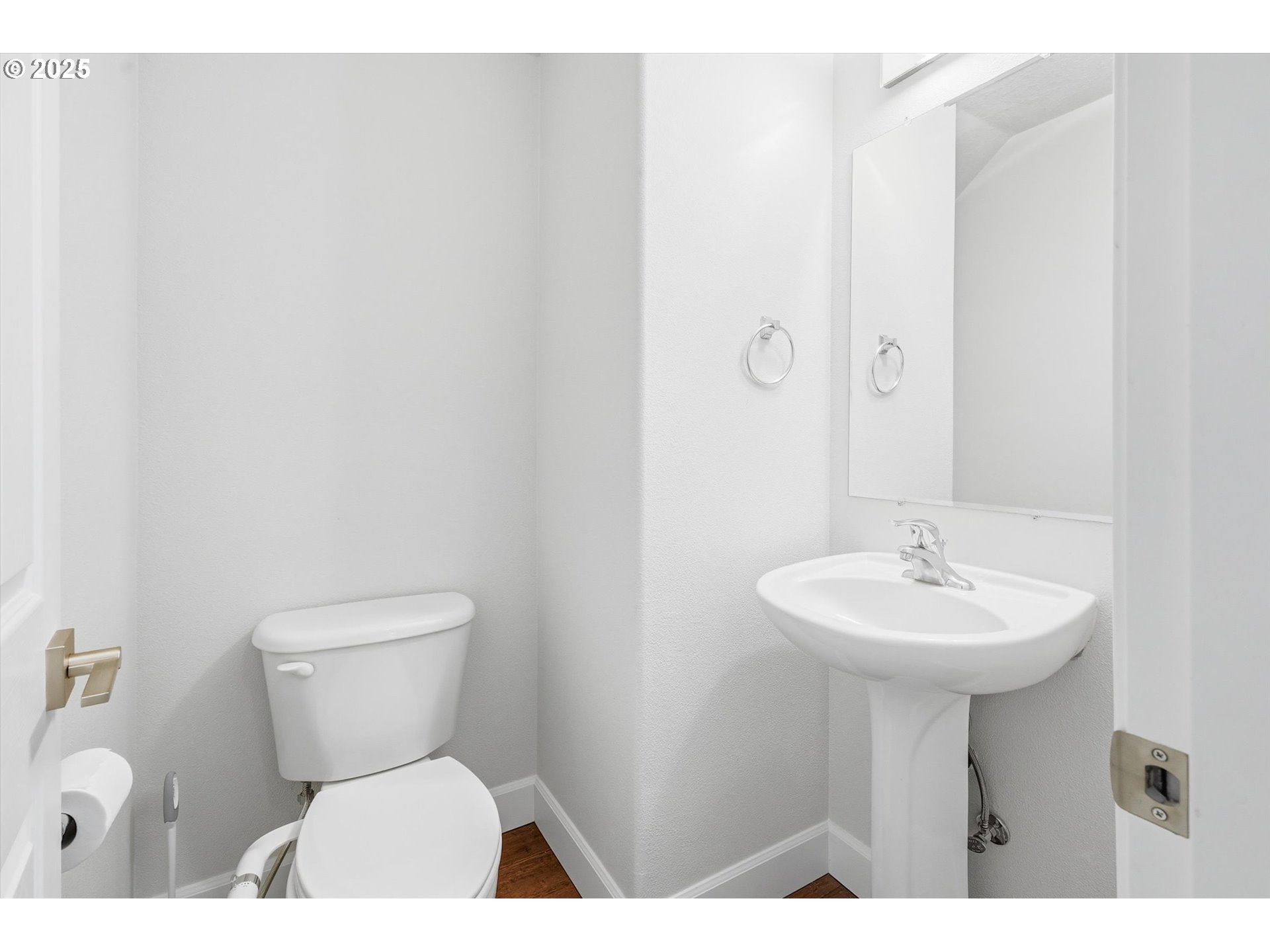 13765 Southwest Florentine Avenue Portland, OR 97223 - Photo 18 of 34 a bathroom with a sink a mirror and a toilet