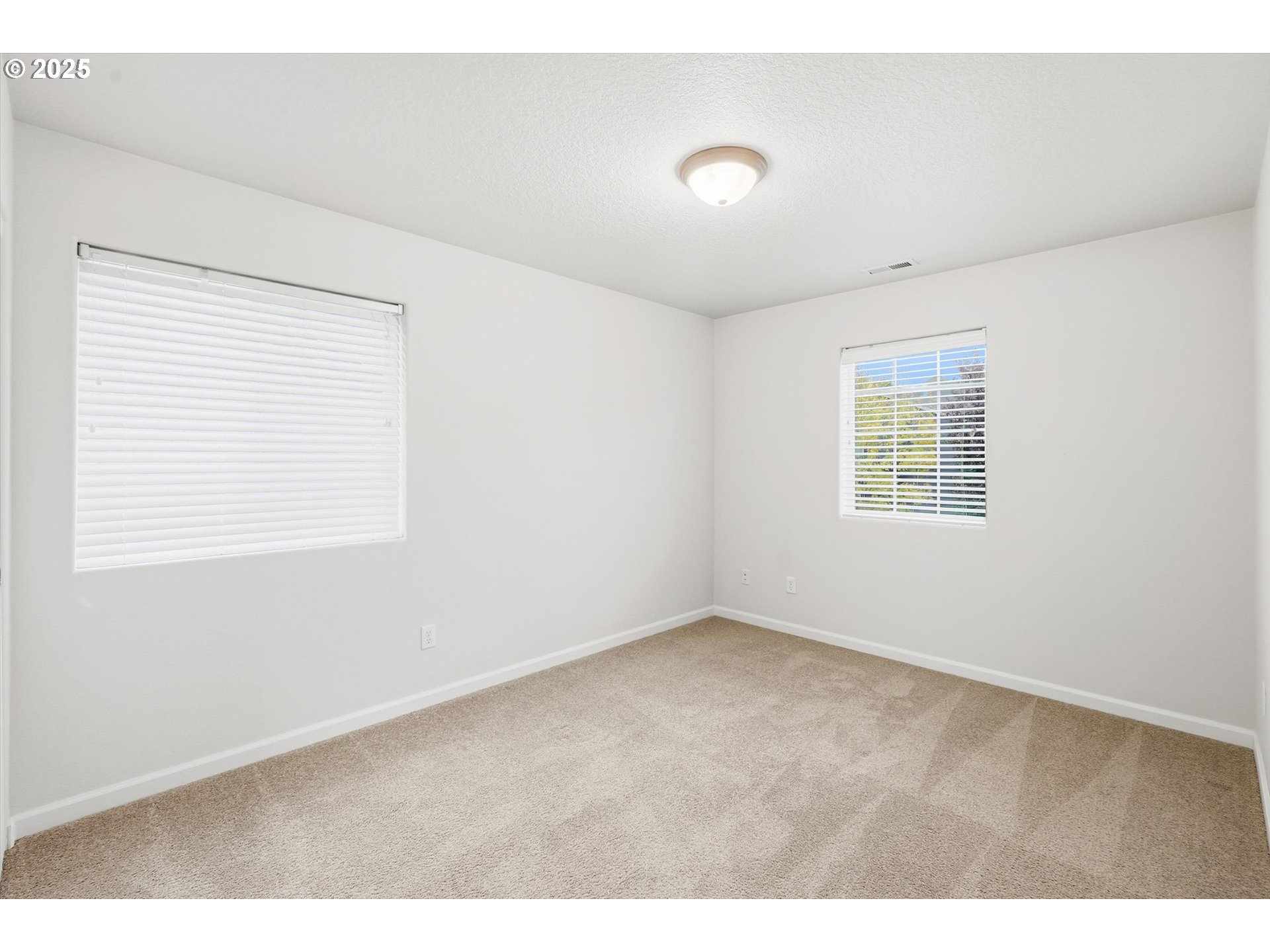 13765 Southwest Florentine Avenue Portland, OR 97223 - Photo 27 of 34 a view of an empty room with a window