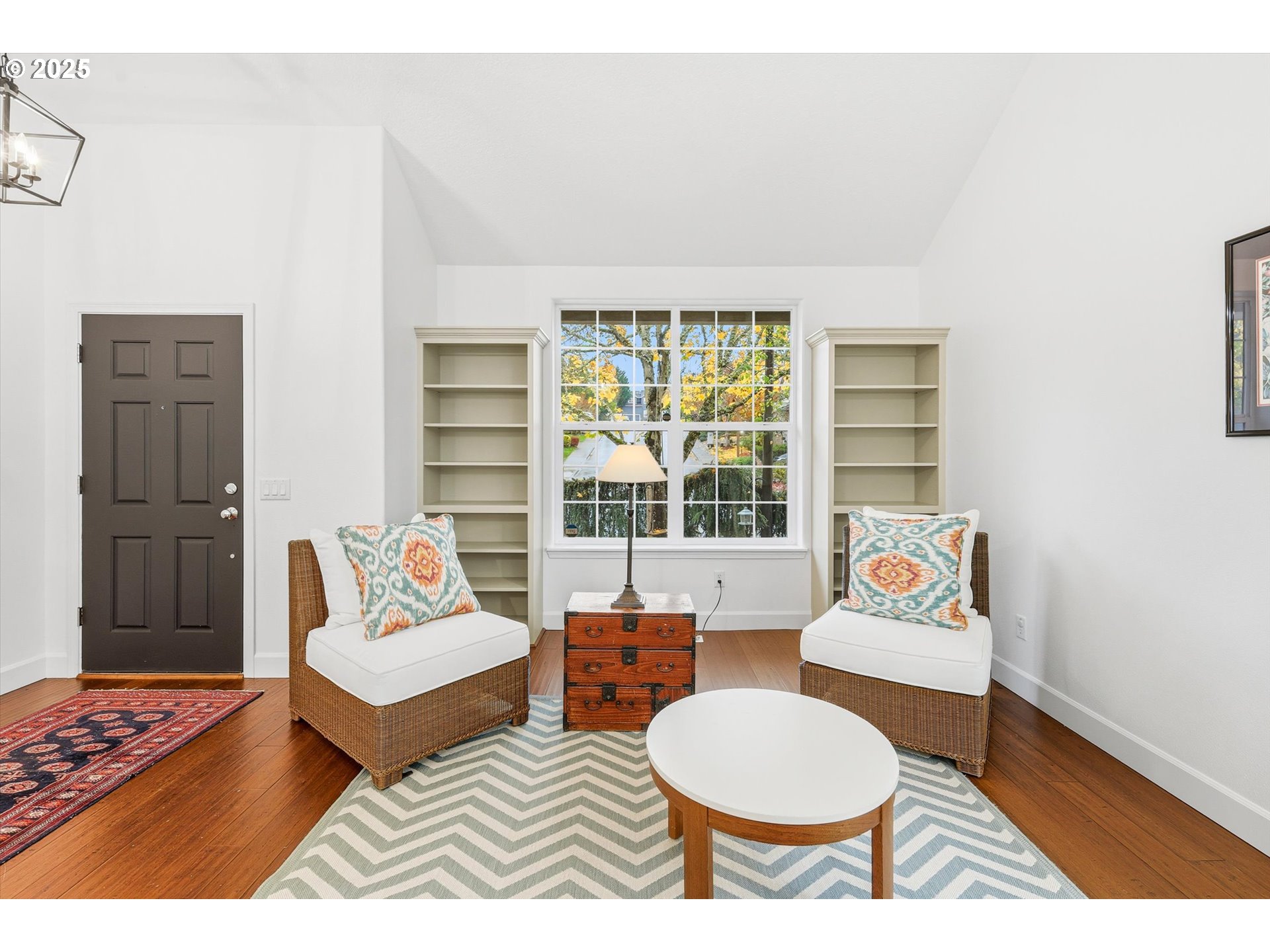 13765 Southwest Florentine Avenue Portland, OR 97223 - Photo 5 of 34 a living room with furniture and a rug