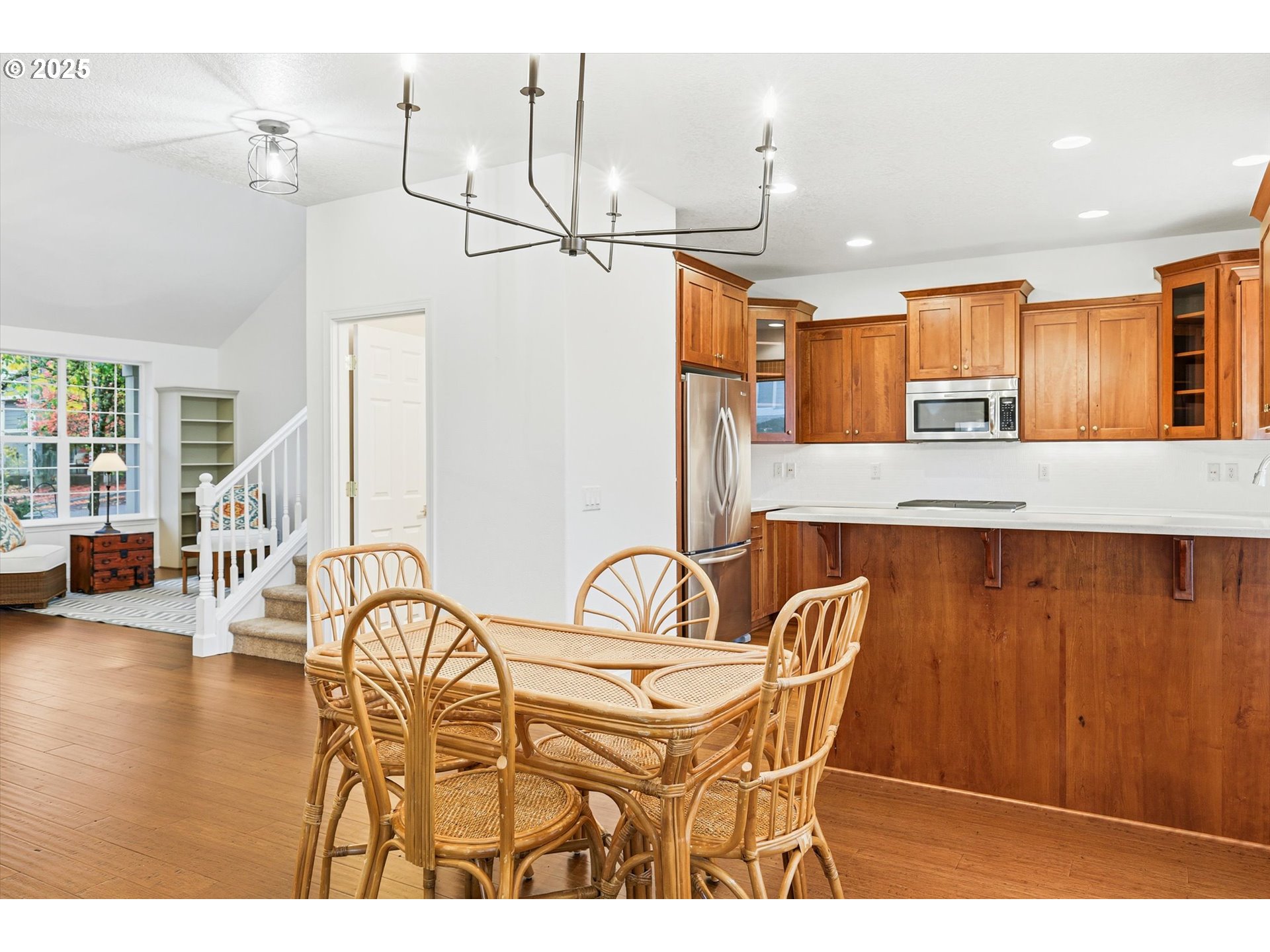13765 Southwest Florentine Avenue Portland, OR 97223 - Photo 9 of 34 a view of a dining room with furniture and wooden floor