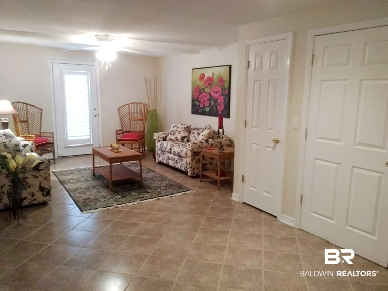710 South Mobile Street, Unit 23 Fairhope, AL 36532 - Photo 9 of 42 Den w/ laundry & storage