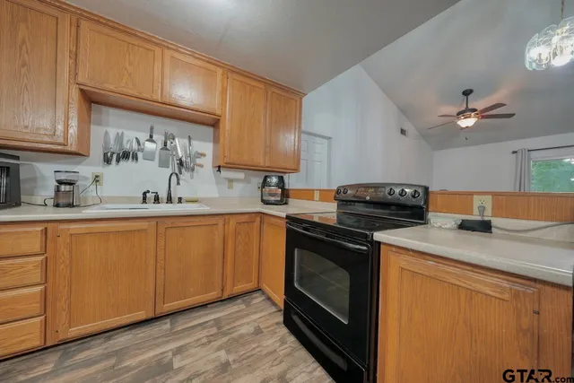 a view of a hallway with washer and dryer
