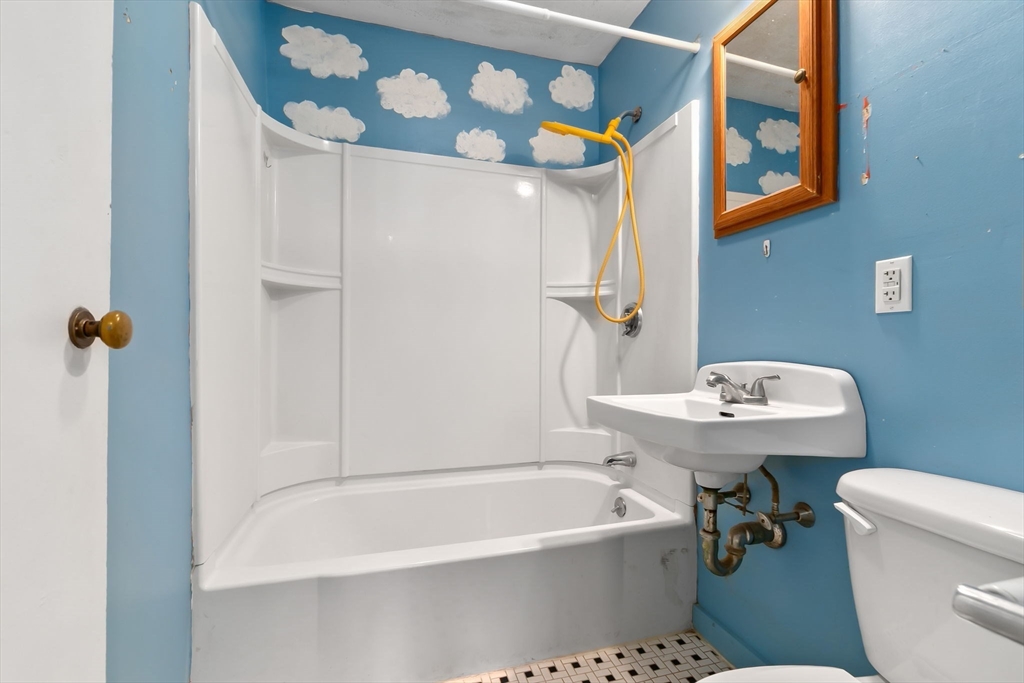 71 Union Street Hamilton, MA 01982 - Photo 11 of 21 a bathroom with a sink a toilet and bathtub