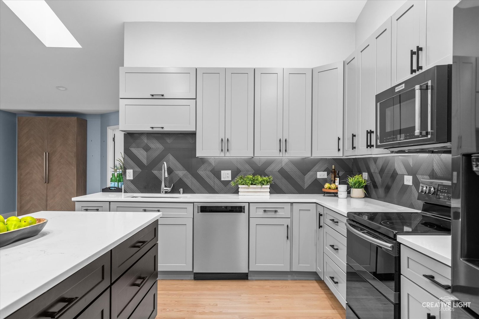 838 Havenshire Road Naperville, IL 60565 - Photo 16 of 48 a kitchen with stainless steel appliances white cabinets sink and stove top oven