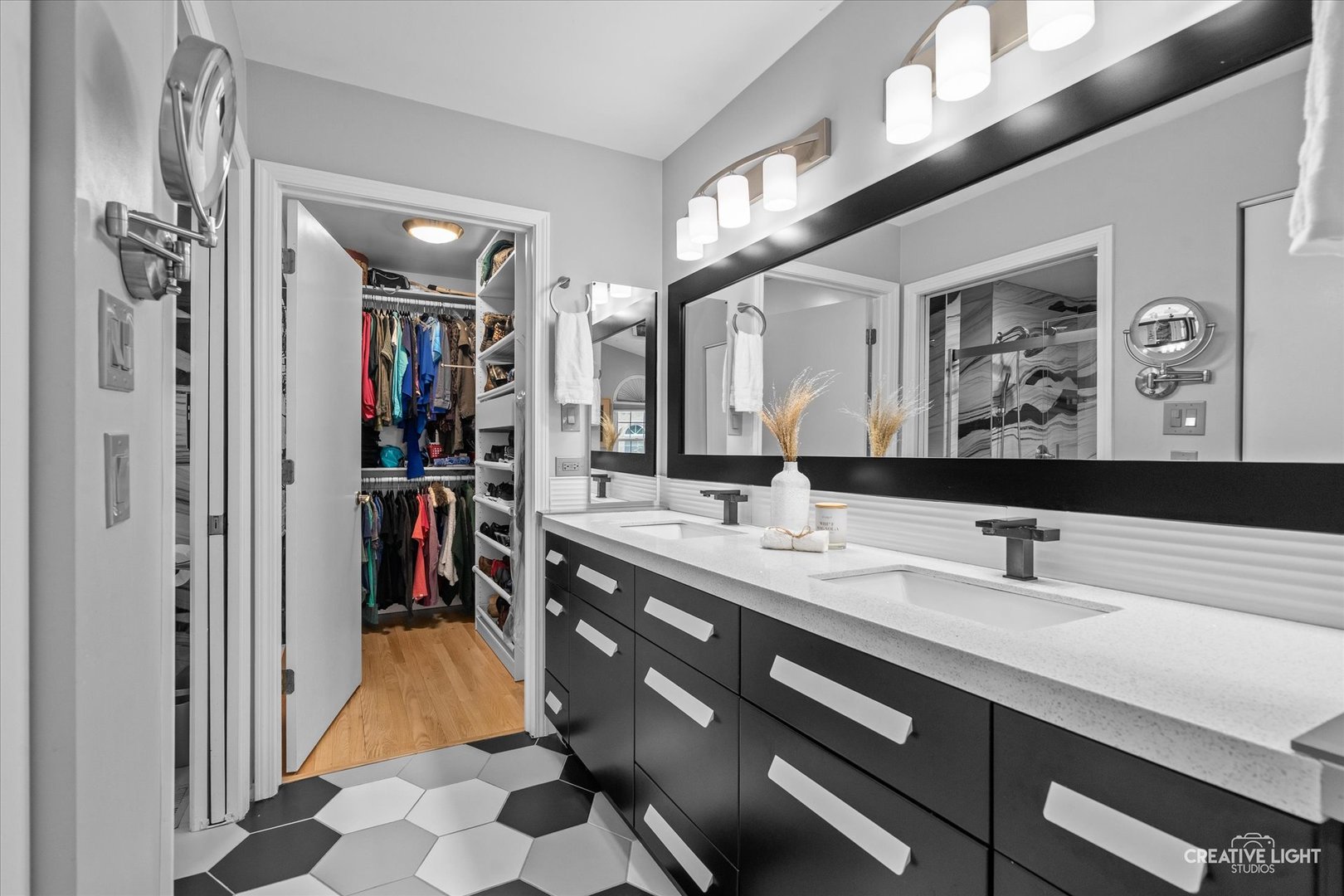 838 Havenshire Road Naperville, IL 60565 - Photo 25 of 48 a en suite bathroom with a double vanity sink and a mirror