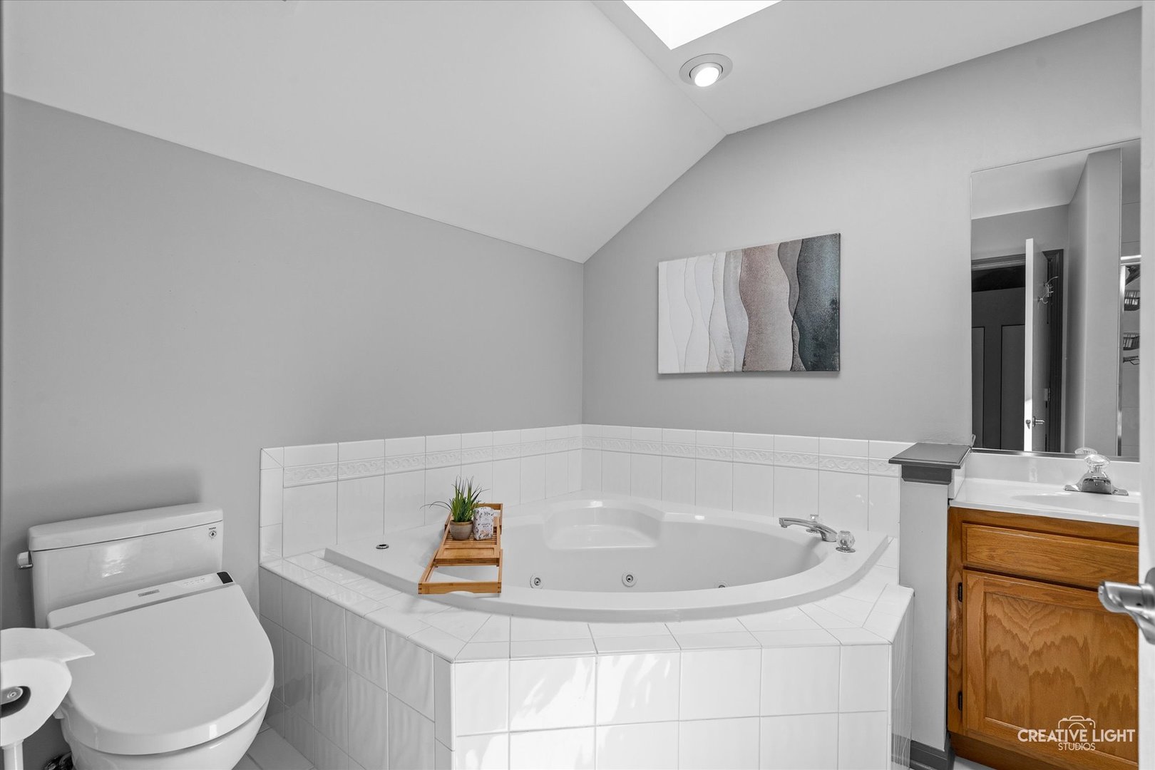 838 Havenshire Road Naperville, IL 60565 - Photo 32 of 48 a bathroom with a sink a toilet and vanity