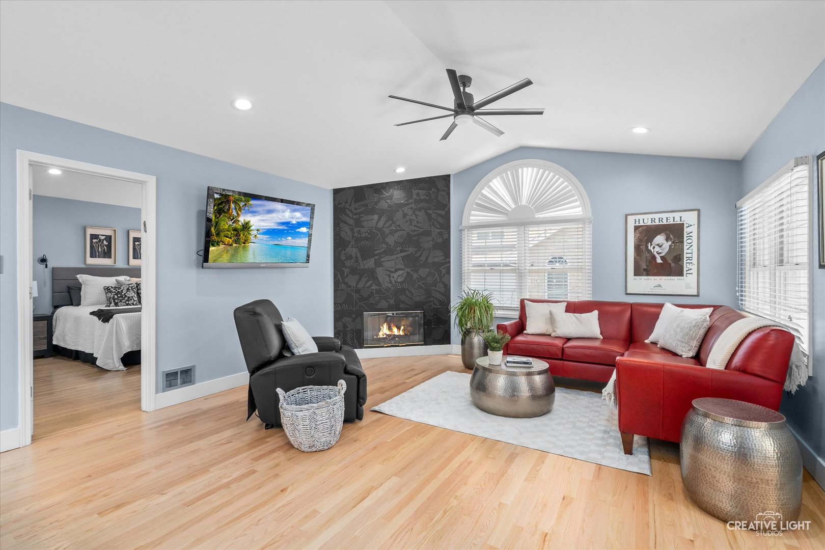 838 Havenshire Road Naperville, IL 60565 - Photo 4 of 48 a living room with furniture fireplace and a flat screen tv