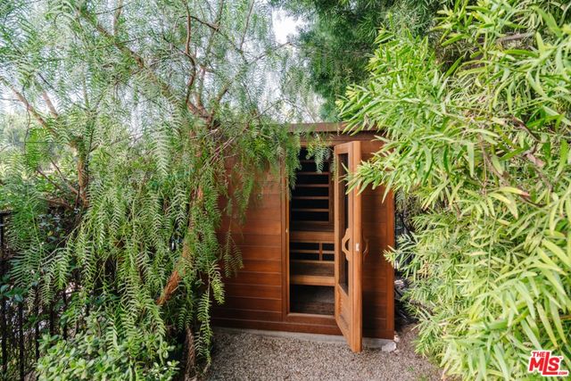 a view of swimming pool with outdoor seating