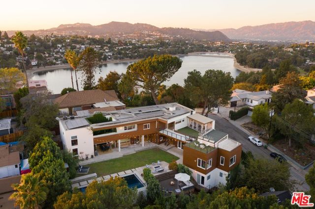 a view of a yard with patio