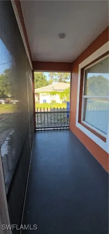 a view of porch with large windows