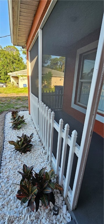 4731 15th Street Southwest Lehigh Acres, FL 33973 - Photo 4 of 19 a view of an chairs and table in the balcony