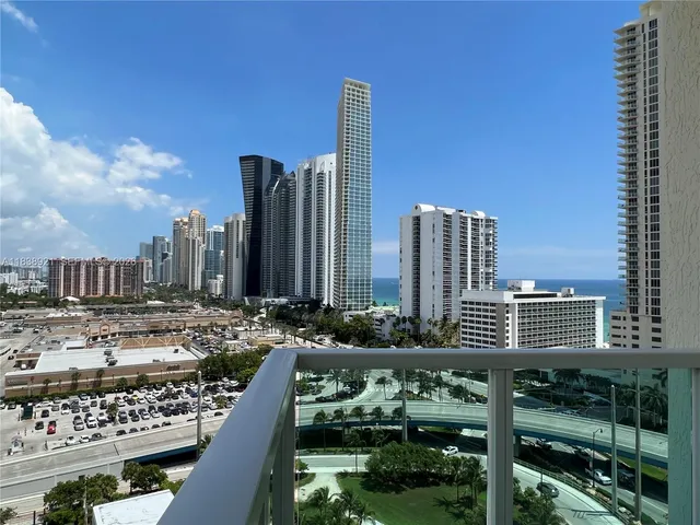 a view of city with tall buildings