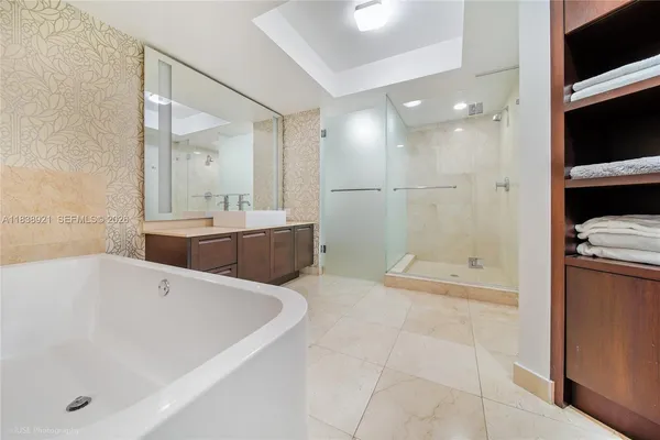 a bathroom with a bathtub and a sink