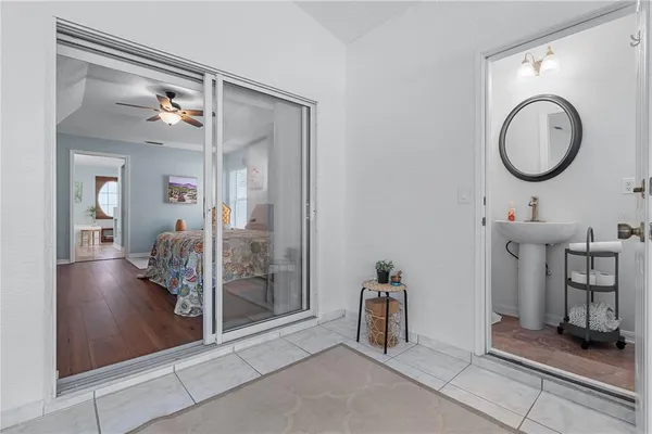 a bathroom with a sink and a mirror