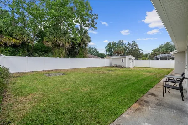 a view of a house with a big yard