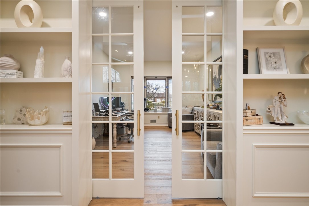 13 Shingle Mill Road Irondequoit, NY 14609 - Photo 19 of 50 NEW Built-in shelving and molding-French doors to