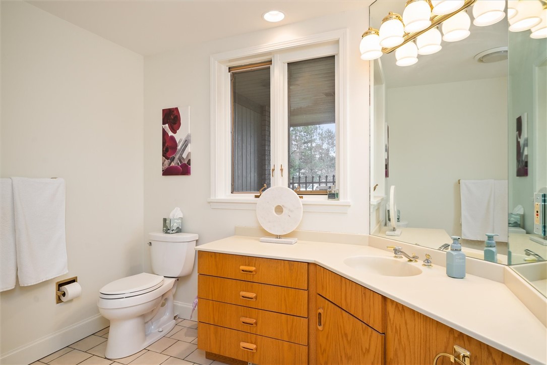 13 Shingle Mill Road Irondequoit, NY 14609 - Photo 22 of 50 Powder room off main living space-spacious and has